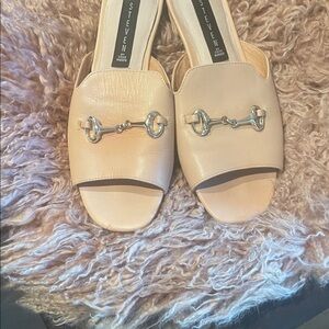 Steven Women's Tan Sandals with gold horsebit accents.